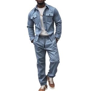 Detail of light blue faux suede texture on men's jacket with button and collar focus