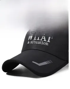 Detail of a black baseball cap with rigid brim and white WHAT embroidery on the front