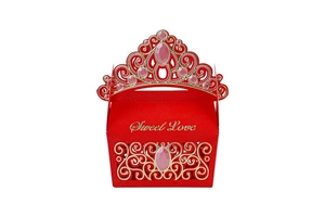 Detailed laser-cut crown gift box in red with golden Sweet Love text and pink gemstone