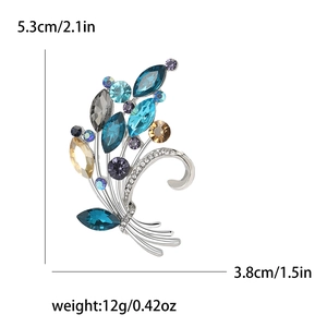 Detailed view of alloy flower brooch with dimensions 5.3cm x 3.8cm and crystal accents
