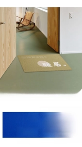 Detailed view of PVC coil door mats with non-slip texture and hello welcome graphics