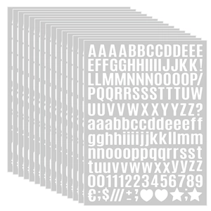 Macro view of multi-sheet alphabet and number stickers for DIY craft decoration