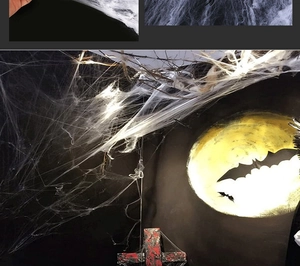Elastic white spider web with black spiders for Halloween haunted house scene decoration