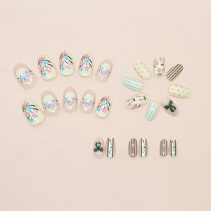 Floral press-on nail set with 24 pieces featuring pink bows and cherry patterns