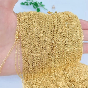 Bundle of gold-plated copper necklaces with fine water wave and box chain textures