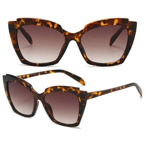 Cat eye sunglasses with tortoiseshell frame and gradient brown lenses in two views