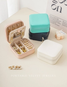 Portable travel jewelry box with mirror and velvet compartments in multiple colors