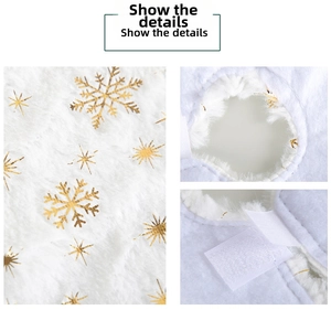 Detail of white plush Christmas tree skirt with golden sequin snowflake patterns