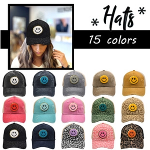 Collage of baseball hats in 15 colors featuring a trendy smiley face patch design