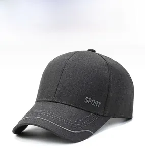 Detail of dark grey knit baseball cap with grey SPORT embroidery and fine brim stitching