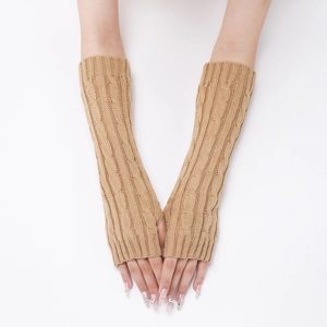Macro detail of khaki cable knit fingerless gloves with elegant textured arm warmers