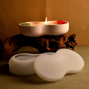 Detailed silicone mold and striped bow storage box for DIY plaster and candles