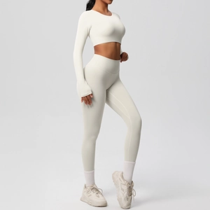 Detail of the high-waisted seamless leggings and thumbhole cuffs on yoga set