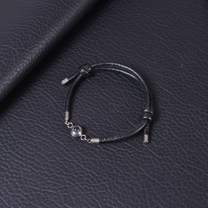 I Love You projection bracelet with 100 languages, black woven cord and silver pendant