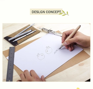 Macro shot of stationery set used for apple sketching on wooden desk background