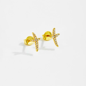 Close-up of gold-plated 925 sterling silver cross stud earrings with sparkling cubic zirconia