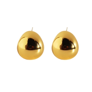 Polished gold teardrop stud earrings in minimalist style on white background