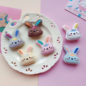 Cute embroidered plush bunny doll heads in various colors for DIY clothing and accessories