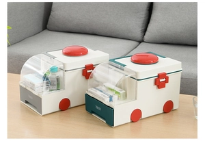 Detail view of ambulance shaped first aid kit box with two-layer storage and top handle