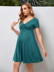 Short sleeve V-neck maternity dress in dark teal with front drawstring detail