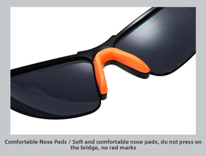 Macro shot of soft orange nose pads on black sports sunglasses for anti-slip comfort