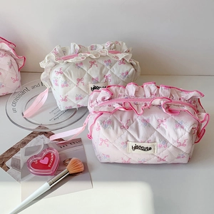 Quilted floral cosmetic bag with lace ruffles and ribbon handle for women and students