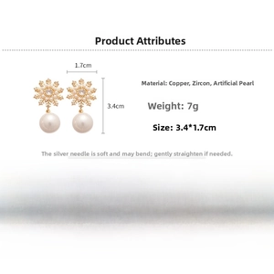 Technical dimensions of snowflake pearl drop earrings with cubic zirconia inlay detail