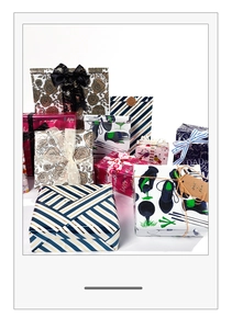 Variety of festive gift wrapping paper for Mother's Day and Father's Day celebrations.