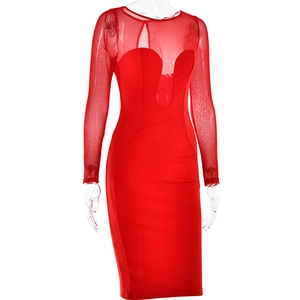 Detail view of red long sleeve dress featuring mesh patchwork and slim fit design
