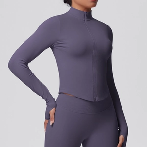Women's slim fit quarter-zip yoga jacket and leggings set in dark mauve knit fabric