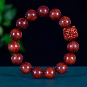 Polished redwood Buddhist prayer beads featuring a detailed Pixiu lion carving charm