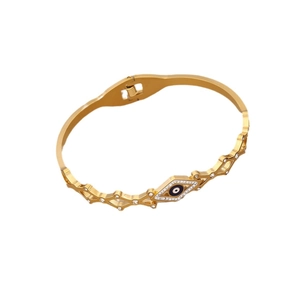 Golden evil eye bracelet with white zircon pave and geometric cutout details on white background