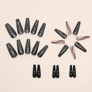 Sparkly black glitter long coffin press-on nails with pearl accents and swirl designs