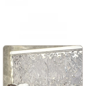 Detail of U-shaped slot design on ripple-textured bathroom shelf for toothbrush storage