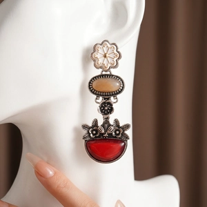 Vintage style floral drop earrings with colorful gemstones and retro silver textures