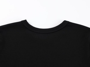 Close-up of the round neckline and fabric texture on a black modal stretch T-shirt