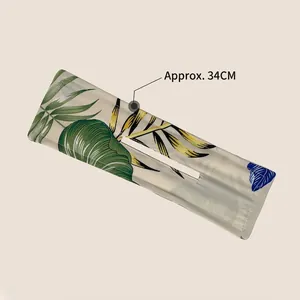 Floral print magic deft bun hair maker tool with tropical leaf patterns 34cm length
