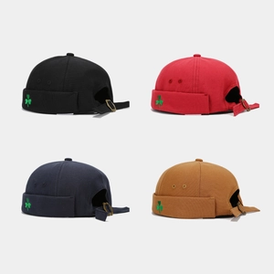 Fashionable docker hats with clover embroidery in black, red, navy, and tan colors