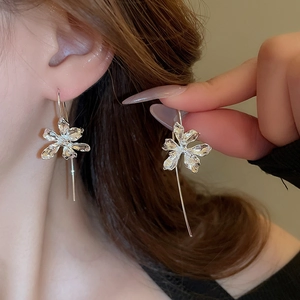 Vintage silver iris flower dangle earrings with minimalist metallic petals for women