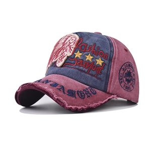 Detailed embroidery and vintage washed texture on this distressed retro baseball cap