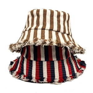 Retro striped canvas bucket hats with frayed edges for a casual streetwear fashion look
