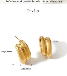 Detailed view of gold double-hoop earrings featuring pave zircon stones and sleek metal