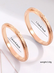 Detail showing rose gold frosted rings with size 1.6cm and 1.7cm dimensions and weight