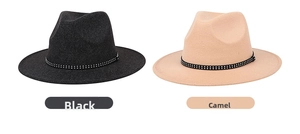 Detailed comparison of camel and mixed black wide-brim fedora hats with rivet bands