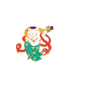 Chengdu souvenir enamel brooch featuring a white cat playing pipa in Tang style