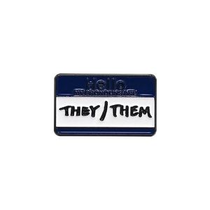 Close-up of enamel pin with They/Them pronouns and blue Hello My Pronouns Are text