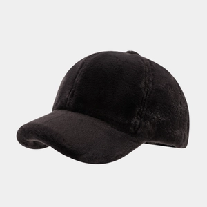Close-up of soft plush texture on minimalist black winter baseball cap for women