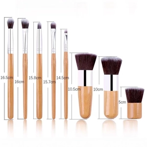 Eco-friendly 8pcs bamboo makeup brush set with synthetic bristles on white background