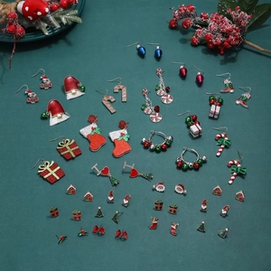 Christmas earrings collection featuring Santa, Snowman, and festive charms set