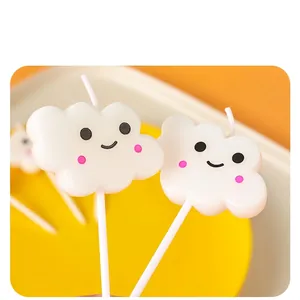 Cute white cloud shaped candle with smiley face for birthday cake decoration